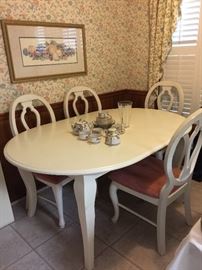 Sturdy!  Kitchen table, four chairs, has additional leaf.