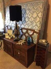 King bed, nightstands, incredible lamp with black velvet shade.