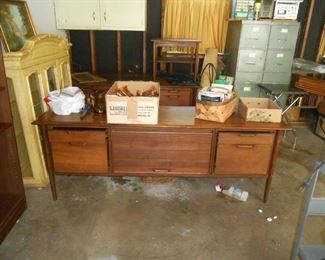 These are in the garage----I think this is teakwood and in great condition! Roll open center