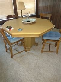 Game table with chairs.