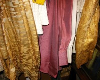 bar cloth and pleated drapes. 