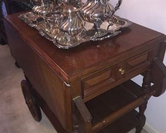 one of two solid Teak tea carts
