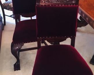 we have a pair of these intricately carved "throne" chairs that feature lions on the back piece plus "Ball and claw" feet