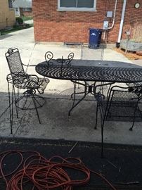 wrought iron table & chairs & plant holder