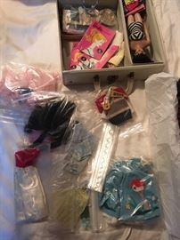 Large collection of Barbie clothes