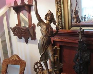 1 of pair of statues Le Telephone and Le Telegraph