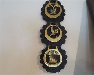 Tri of Horse Brasses on old Leather