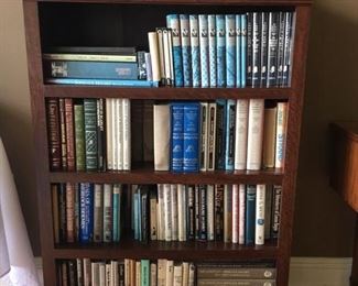 heavy bookshelf and Sherlock Holmes books