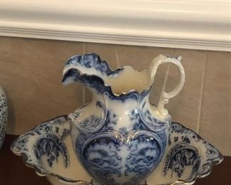 Flow blue-themed antique look basin and pitcher