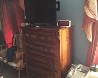 TV, Dresser that goes with 3 peice bedroom set, oxygen concentrator, and wooden bench