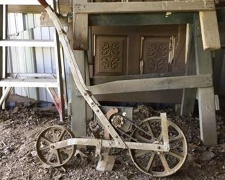 used to plant seeds, ladder and antique door with frame in background