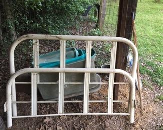 Antique metal bed with rails
