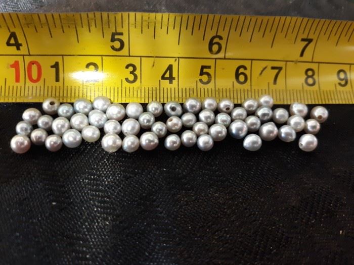 53 very small pearls, bluegrey