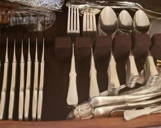 Placesetting for 12 of Gorham Stainless Flatware