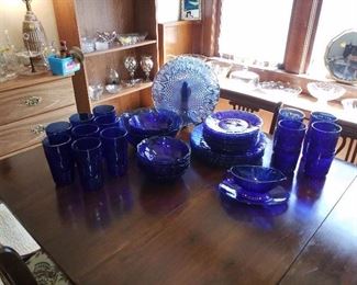 Blue dishes on a antique drop leaf table