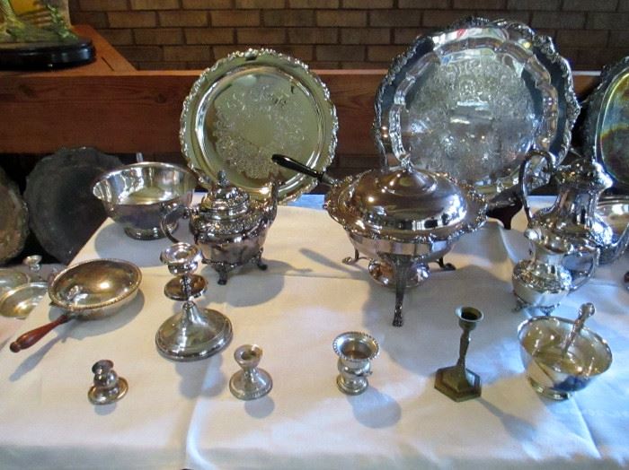 ONE OF TWO TABLES OF SILVERPLATE