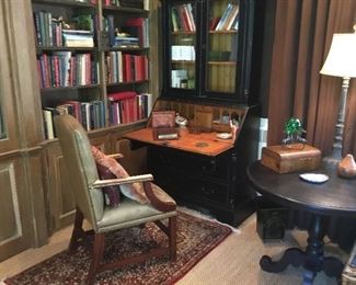 Tall black drop front secretary , black round table 