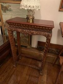 #10 Tall Entry Table w/flower carvings   20x10x30    $ 150.00