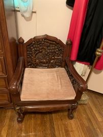 #82 (4) Carved Low profile Chair w/elephant carvings  27" widex25x16 (seat height)  $200 Each  $ 800.00