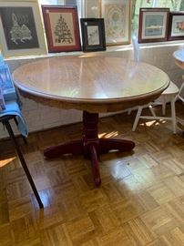 #135 Oak Round Table w/Carved Sides Pedestal w/red painted base   42x30  $ 100.00