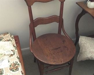 Antique chair with round seat
