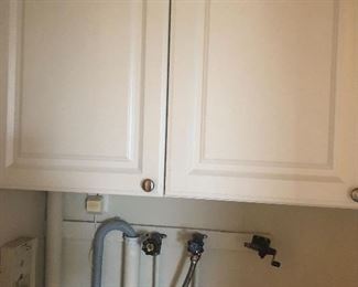 WHITE CABINETS IN LAUNDRY AREA