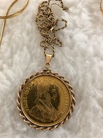 Large gold coin set in 14k bezel and 14k chain