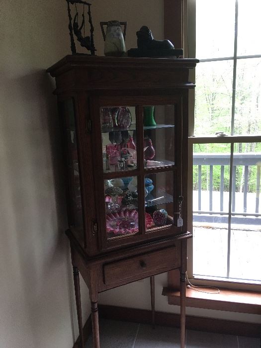 Vintage china cabinet with antiques 