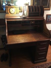 Antique Rand & Leopoldo Desk Co Rolltop Desk with label
Antique running mantle clock 