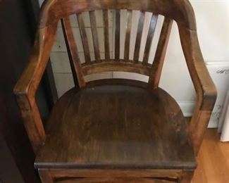 One of a pair of office chairs. Solid wood --beautiful