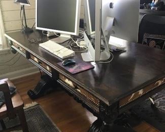 Large desk from  Catrina's Ranch Interiors of San Antonio. Large enough to be a partners desk as seen here. Drawers on one side only.Computers not for sale at this point, Lamps are included in the sale.