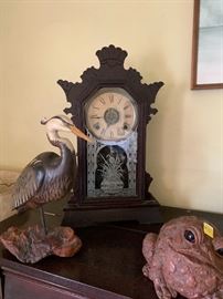 Antique clock, wooden bird and toad.