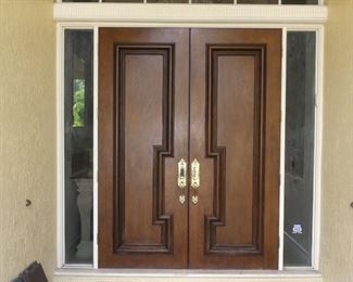 Exterior view of front doors with Baldwin brass hardware