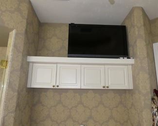 White paneled door cabinets