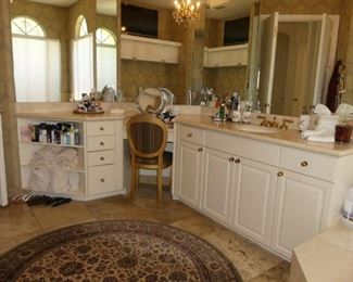 White bathroom vanity cabinets with make-up counter