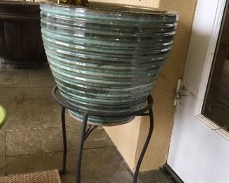 Large planter on iron stand