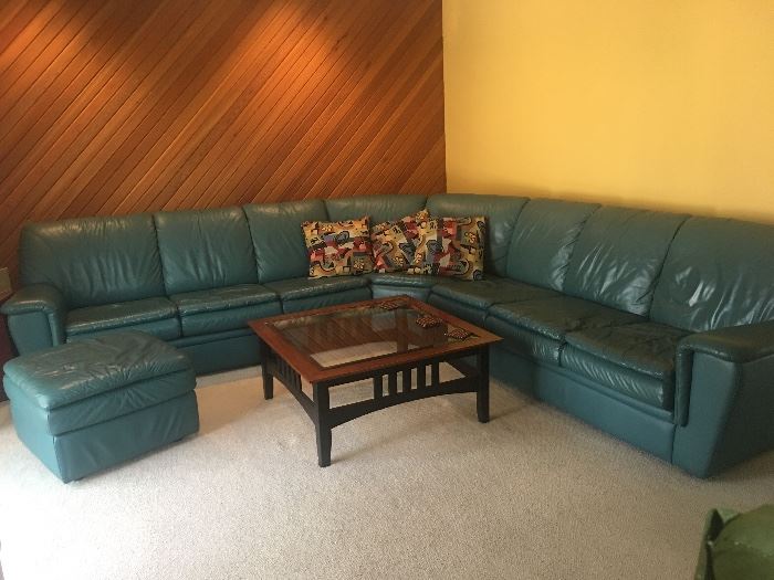 Leather sectional with Ottoman and Coffee Table