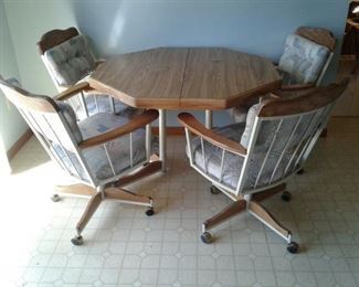 Kitchen Table with Four Captains Chairs