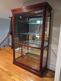 INCREDIBLE!! Howard Miller display cabinet - front slides for easy display and cleaning.