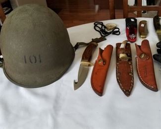 WWII helmet and various knives
