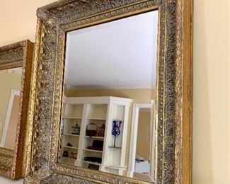 Beveled mirror with antique frame