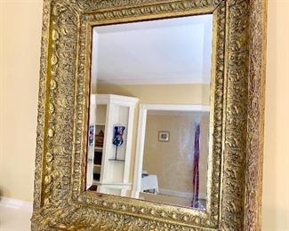 Beveled mirror with antique frame