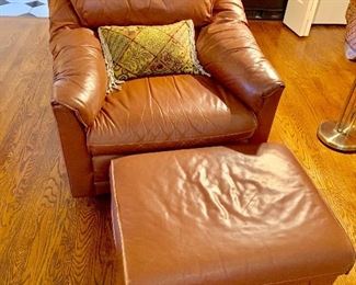 Chocolate leather arm chair and ottoman