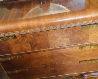 Part (3) of a 3-piece 1930/40's waterfall bedroom set.  Short dresser with round mirror pictured here.