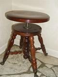 piano stool with glass balls and feet