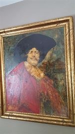 This portrait (painting over a print, we believe) has a lot of personality! 