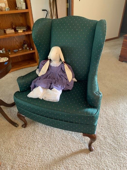 Wing back chair, stuffed rabbit