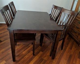 $125   Table with four chairs