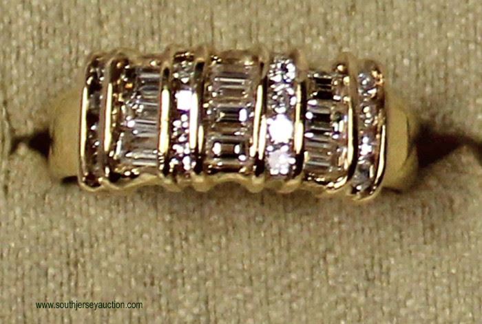 14 Karat Yellow Gold 1 CTW Diamond Band
Auction Estimate $500-$1000 – Located Inside

