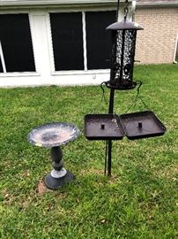 Outside birdbath and birdhouse